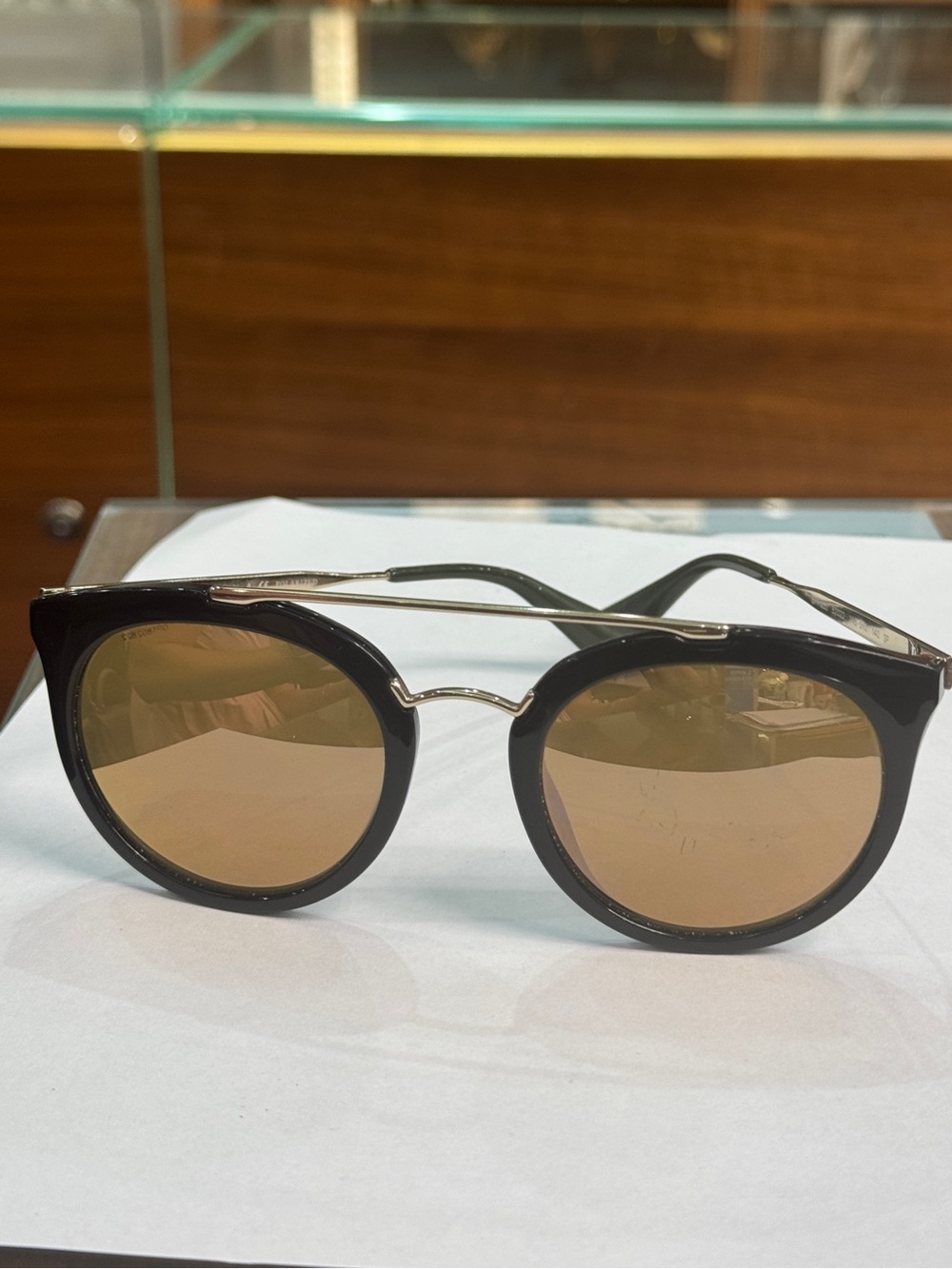 AUTHENTIC PRADA Round Black Frame Sunglasses with Brown Lenses
